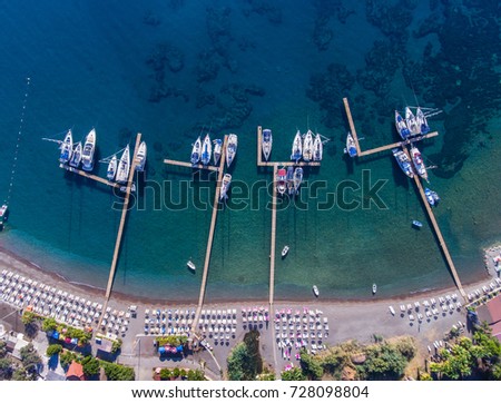 Top view of the beach and piers in the town of Ciftlik, Turkey.