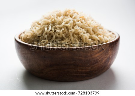 Stock Photo of cooked Brown Basmati rice served in a bowl, selective focus
