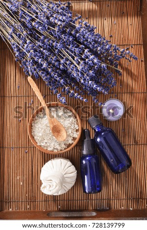 lavender with towel, with herbal ball. salt in bowl oil ,for massage spa