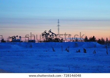 oil pumps, sunset, winter, Surgut, Russia