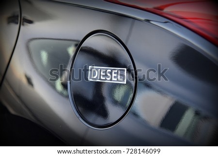 diesel sign on car fuel tank lid 
