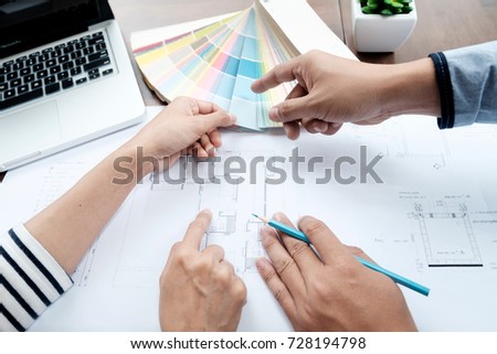 Architectural and Interior designer and Engineer team to meeting and select color for house project.