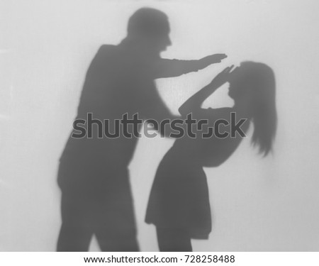 Silhouette of man hurting his wife on white background. Domestic violence concept Royalty-Free Stock Photo #728258488