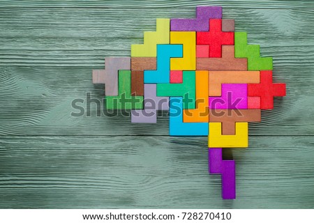 Human brain is made of multi-colored wooden blocks. Creative business concept. Royalty-Free Stock Photo #728270410
