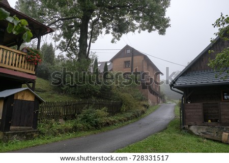 Village Pulcin in Czech Republic, typical for the mountain ranges in the Carpathians. Village with many houses for rent is situated near the landmark rock formation Pulcinske Skaly.
