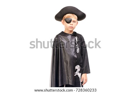 Studio portrait of little boy in Halloween costume against white background