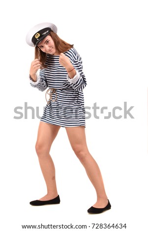 Girl with red hair dressed in stripes dress