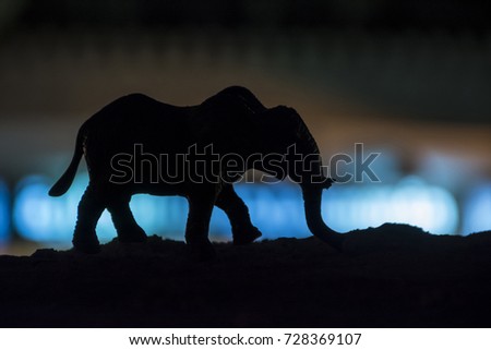 Elephant silhouette, toy photography