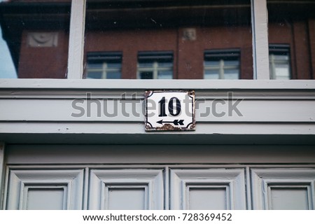 number ten door sign