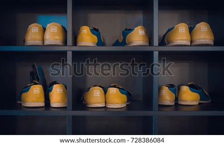 Bowling Shoes on a shelf in a bowling center in Amsterdam, The Netherlands