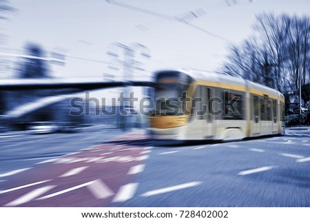 Blurred movement of a New type of Brussels tram on Tervueren street in Belgium
