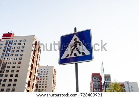 pedestrian road sign on buildinds background