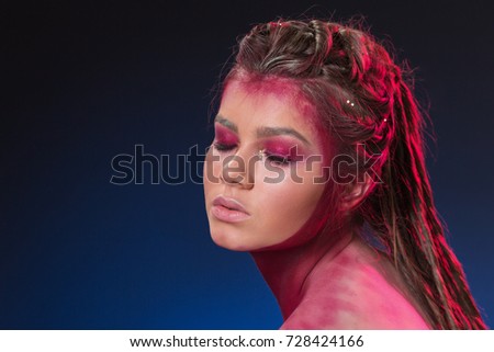 beautiful girl with creative make-up, unusual make-up, creative make-up
