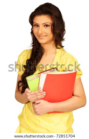 Asian Young teenage girl holding books. Isolated on a white background.