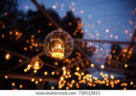 Lights and lanterns in the wedding. Bokeh. Royalty-Free Stock Photo #728522821