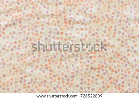 Paper with small hearts as background or texture