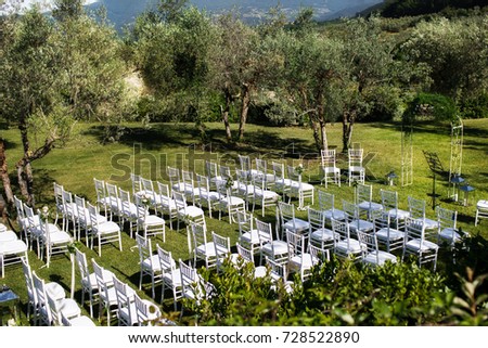 Outdoor wedding ceremony around the green mountains. Villa Bordoni