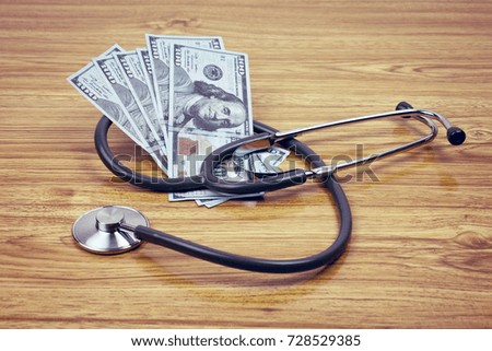 Stethoscope on a stack of money