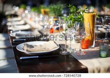 Table set for wedding or another catered event dinner. Italian villa. Villa Bordoni. Royalty-Free Stock Photo #728540728