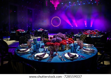 Table set for wedding or another catered event dinner. Royalty-Free Stock Photo #728559037