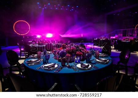 Table set for wedding or another catered event dinner. Royalty-Free Stock Photo #728559217