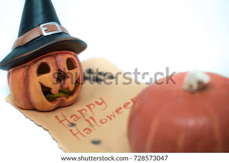 Halloween pumpkin with hat on isolated white background, gourd symbol of american traditional holiday