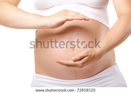 Image of pregnant woman belly with her hands symbolizing protection