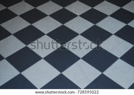 Black And White Checkered Tile Floor - Background Royalty-Free Stock Photo #728595022