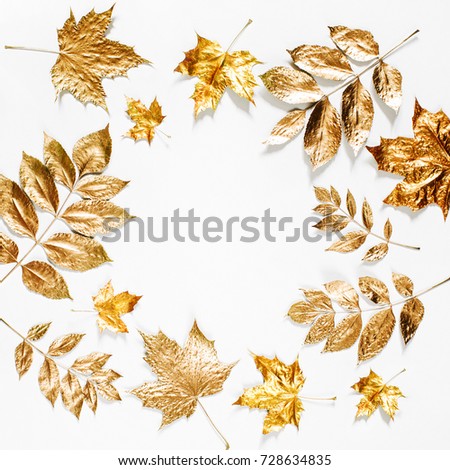 Autumn composition. Frame made of autumn golden  leaves on white background. Flat lay, top view, copy space