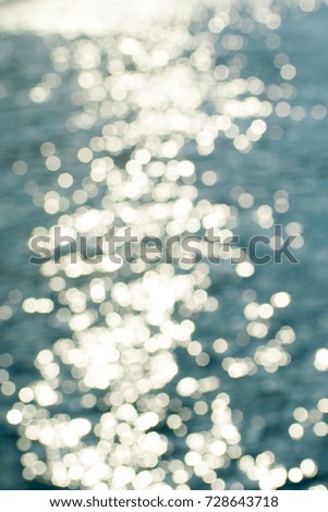 glare bokeh on the water of the sea