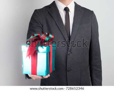 Businessman confirm project .Idea business on white background.he  hold gift box prepare someone.