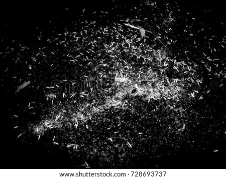 Abstract space made from wood sawdust isolated in black background