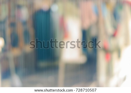Rain in front of house. Blurred abstract image.
