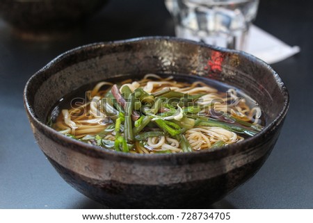 Sansai Soba or buckwheat noodles topped with mountain vegetables which is one of Japanese food