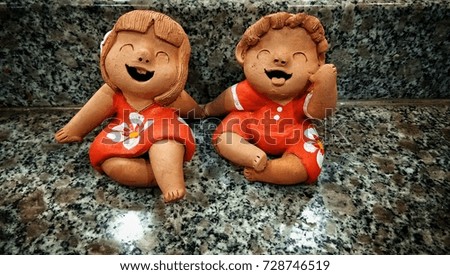 Baby dolls for decoration in room.