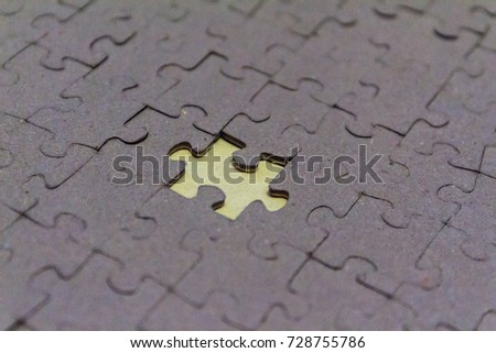 Pieces of the puzzle on the floor