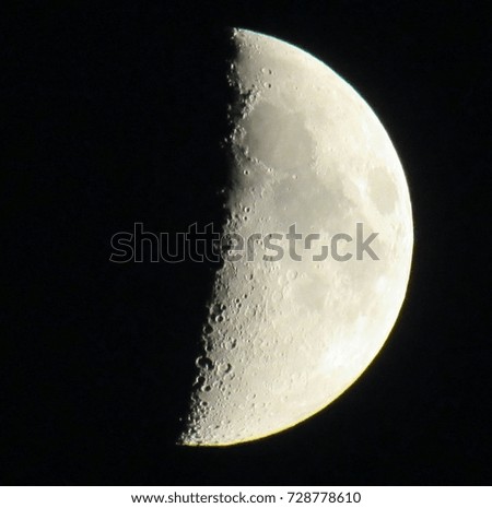 half  moon on black  sky close-up