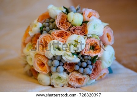 Wedding Bridal party bouquet lies on the surface