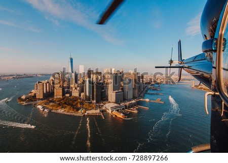 New York City skyline and Hudson River as seen from Helicopter at sunset, One World Trade Center view