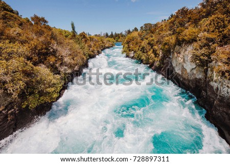 Huka Falls Water on North Island in New Zealand Royalty-Free Stock Photo #728897311