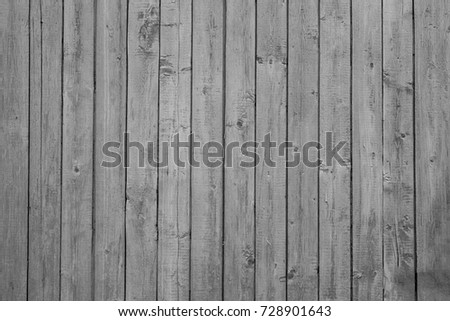 texture of old boards. vertical. black and white.