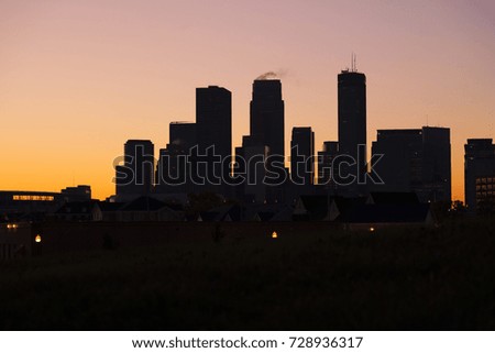 Silhouette of the town of Minneapolis at dawn. 