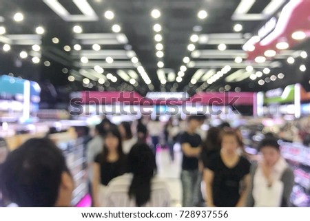 People in market blur picture
