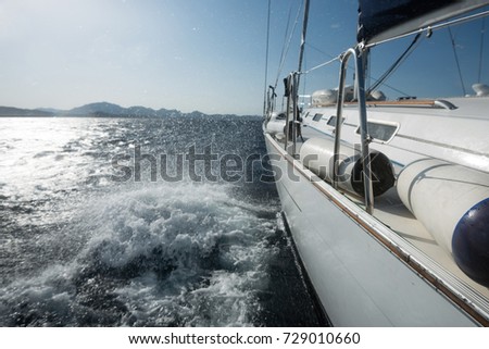 side view of yacht sailing on the sea
