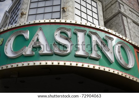A generic  neon Casino sign on facade of building