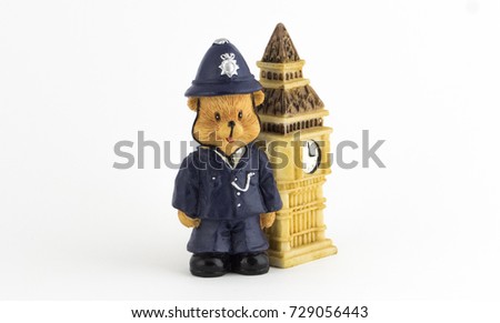 Policeman Teddy Bear and London's Big Ben clock tower
