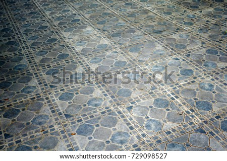 Old ceramic tiles floor with dirty stains