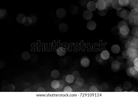 Silver lights bokeh defocus abstract background. Silver Festive Christmas. Glitter twinkled bright background. Royalty-Free Stock Photo #729109114