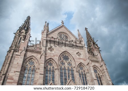 protestant temple saint Etienne on cloudy sky background in Mulhouse - France