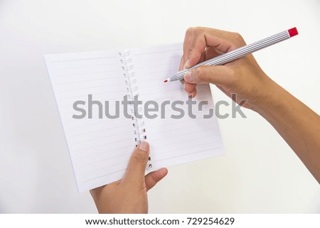 Woman hand with pen on a white background
